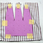 Pattern tapped to fabric